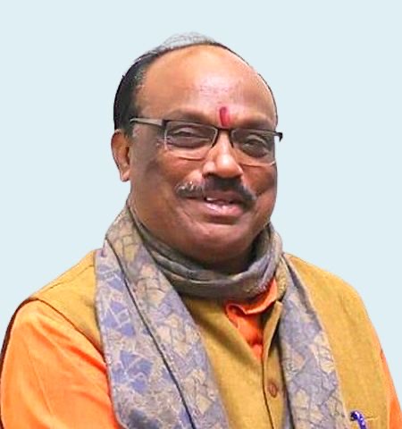 Portrait of Durga Das Uikey wearing spectacles, a saffron kurta, an ochre waistcoat and a patterned scarf